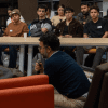 Reunión de personas en evento sobre inteligencia artificial