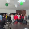 Imagen de funcionarios reunidos