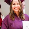 Mujer con diploma del SENA.