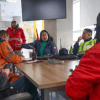 Imagen de los funcionarios en el PMU
