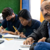 Foto de vendedores informales y comerciantes de Plazas Distritales de Mercado en procesos capacitación y formación en cursos.