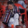 Foto de una mujer integrante de los pueblos Pastos y Kamëntsá en Bogotá.