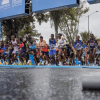 Atletas élite inician la Media Maratón de Bogotá sobre calzada mojada, durante la salida de la competencia internacional de atletismo con participación de corredores nacionales y extranjeros.