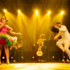 Imagen de una pareja de bailarines de joropo en la tarima de Joropo al Parque.