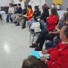 Foto de funcionarios del Distrito en una reunión 