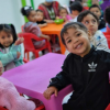 Imagen de niños y niñas sonriendo