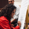 Firma de acuerdos de cooperación entre el Jardín Botánico de Bogotá y 12 centros comerciales. En la imagen se aprecia a Maria Claudia García, directora del Jardín Botánico, firmar el convenio de cooperación.