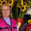 Foto de Luz Mary Rodríguez, vendedora de flores en uno de los puntos del IPES en Bogotá.