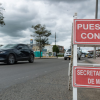 Foto que muestra vehículos andando por las calles