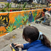 Imagen de materas pintadas en la plazoleta de La Marichuela
