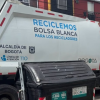 Foto que muestra un carro recolector de basura 