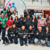 Grupo de personas reunidas en el interior del centro comercial Ciudad Tunal durante la firma de un compromiso para el cuidado de las coberturas vegetales de Bogotá.
