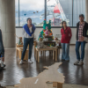 Imagen de personas reunidas en el 3 piso del Museo de la Ciudad Autoconstruida