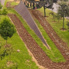 Vista aérea del Monumento de las tres pirámides de Longos con nueva jardinera intervenida por el Jardín Botánico de Bogotá