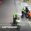 Policías capturando a dos hombres en estación de gasolina en Suba.