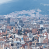 Panorámica de Bogotá con alta concentración de edificios residenciales y de oficinas, avenidas y construcciones de diferentes alturas.