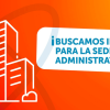 Ilustración gráfica de edificios delineados en color blanco sobre fondo degradado naranja y rojo, junto a un globo de texto con el mensaje: “¡BUSCAMOS INMUEBLE PARA LA SEDE ADMINISTRATIVA!”.