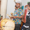 Palanqueros tocando instrumentos musicales en un evento en Bogotá.