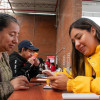 Foto de una mujer en una de las jornadas de atención de Ingreso Mínimo Garantizado en Bogotá.