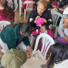 Mujeres y menores de edad participando de los programas de la Secretaría Distrital de Integración Social