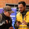 Foto de dos personas en una feria de Ingreso Mínimo Garantizado en Bogotá.