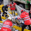 Funcionarios del Distrito durante desmonte de cambuches en tramo de la calle 26.