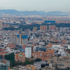 Vista panorámica de Bogotá desde un punto elevado, con numerosos edificios residenciales y comerciales de diferentes alturas que se extienden por la ciudad.
